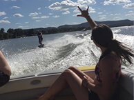 a picture of a woman riding a boat